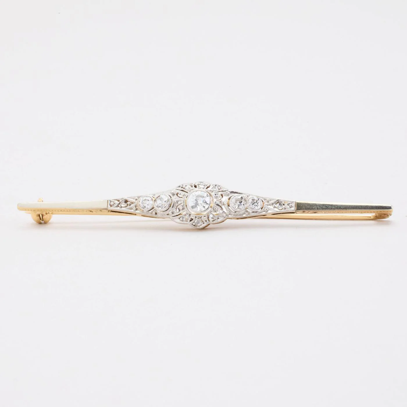 Brosch med diamant (0.66 ct) i 14K guld och vitt guld, 7.3 cm, 5.72 g