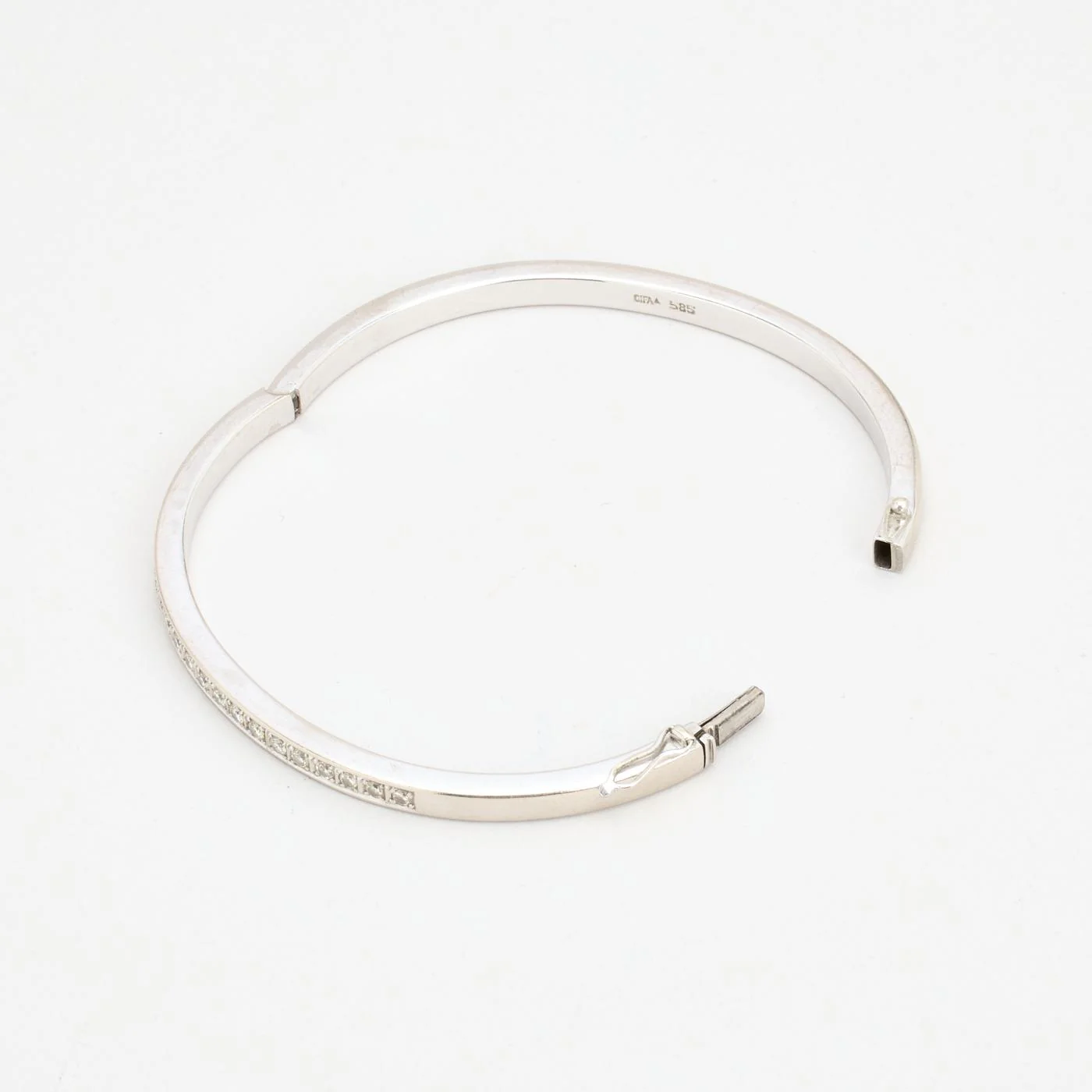 Klassisk armring med lås med diamant (0.39 ct) i 14K guld, 5.9 cm, 9.9 g - Image 6