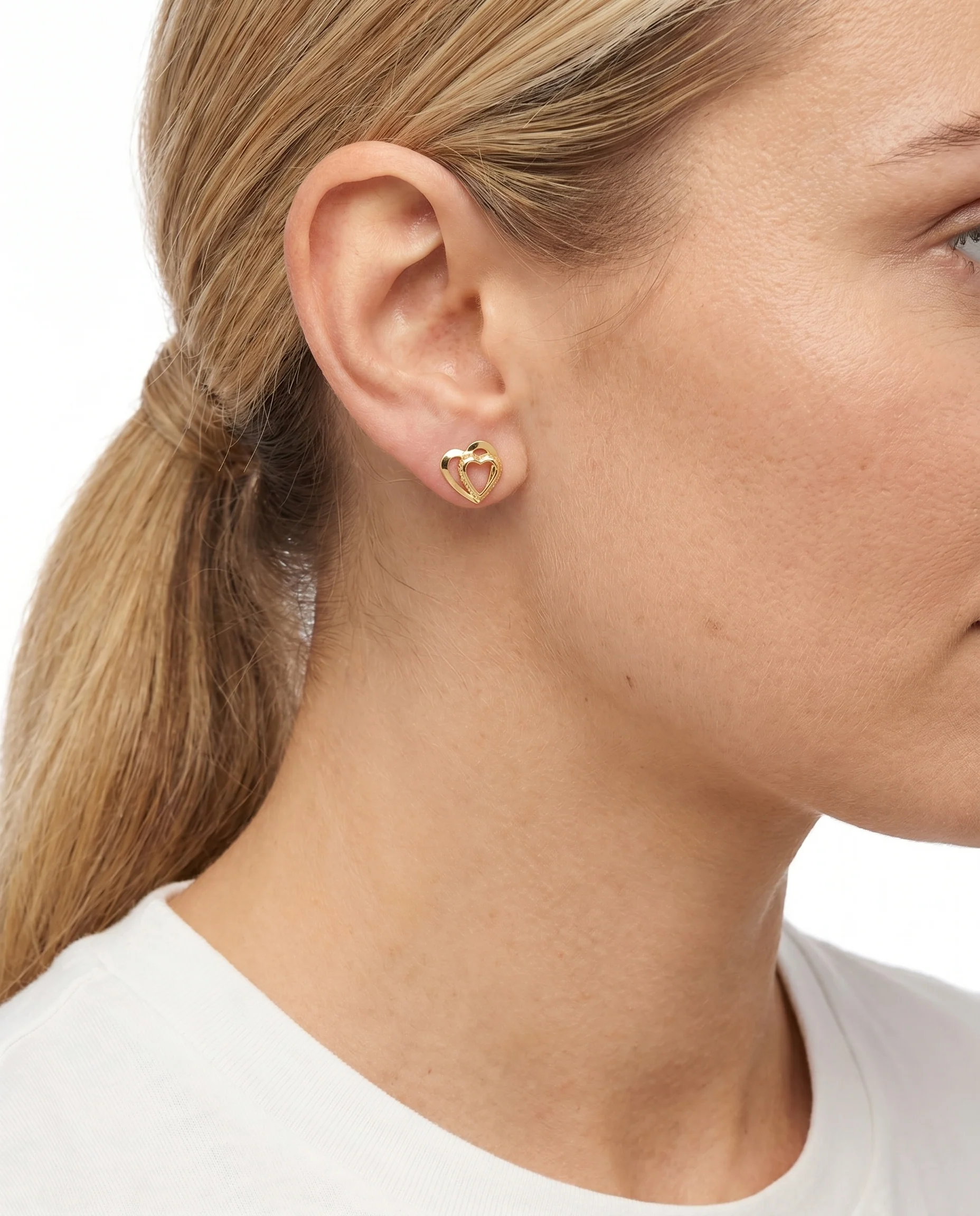 Dubbelt hjärta örhängen i 14K guld, 1 cm,