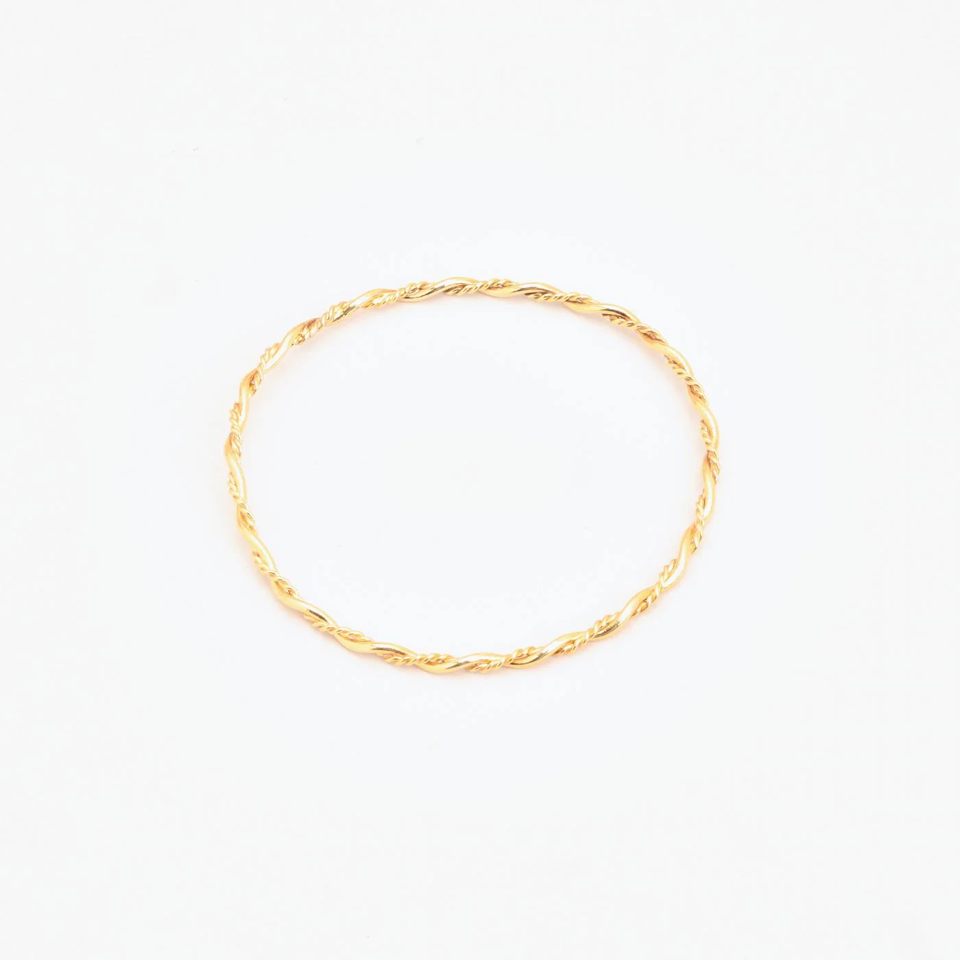 Vridna fast armring i 14K guld, 6.5 cm, 7 g